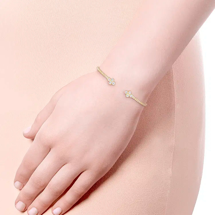 GABRIEL & CO 14K YELLOW GOLD DIAMOND BUJUKAN BEAD SPLIT CUFF WITH QUATREFOIL DIAMOND ENDCAPS