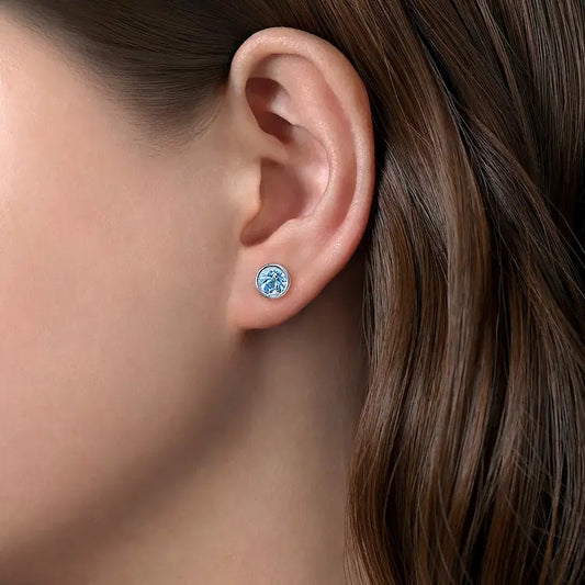 GABRIEL & CO STERLING SILVER AND BLUE TOPAZ BEZEL SET STUD EARRINGS
