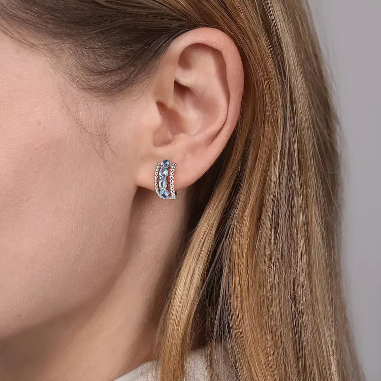 GABRIEL & CO STERLING SILVER AND BLUE TOPAZ HUGGIE HOOPS