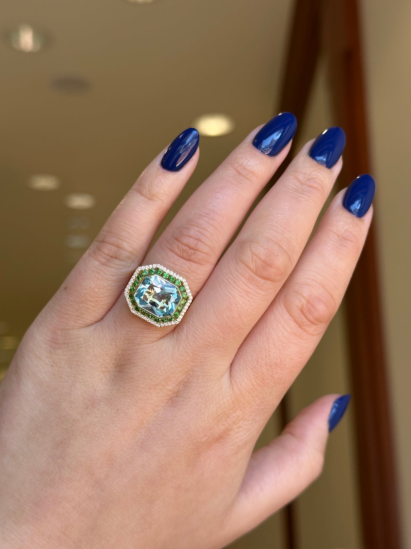 18K YELLOW GOLD DIAMOND RING WITH TSAVORITE AND SKY BLUE TOPAZ