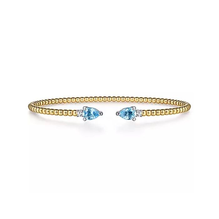 GABRIEL & CO 14K WHITE AND YELLOW GOLD BUJUKAN OPEN CUFF BRACELET WITH PEAR SHAPED BLUE TOPAZ