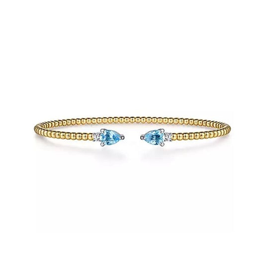 GABRIEL & CO 14K WHITE AND YELLOW GOLD BUJUKAN OPEN CUFF BRACELET WITH PEAR SHAPED BLUE TOPAZ